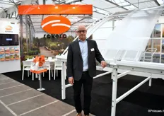 Jan van Hemert of Rovero next to one of their poly greenhouses, especially made for the treenursery industry because the roof can open fully. 